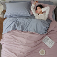 Completo letto in cotone a fibra lunga — blu sereno e rosa cipria