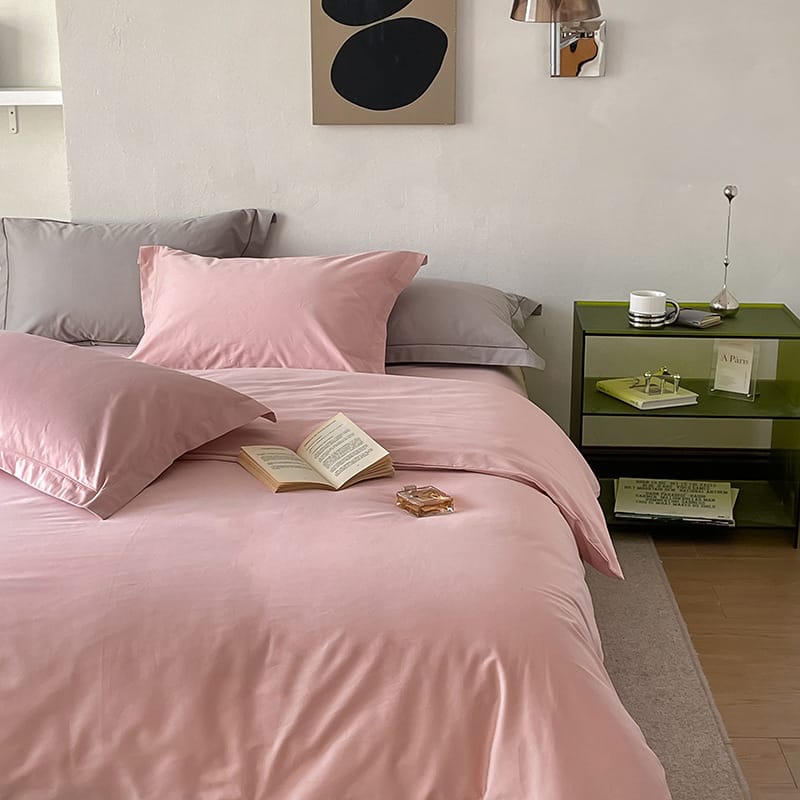 Completo letto in cotone a fibra lunga — rosa cipria tinta unita